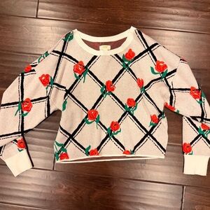 Anthropologie Cream Sweater with Red Floral and Black Geometric Design